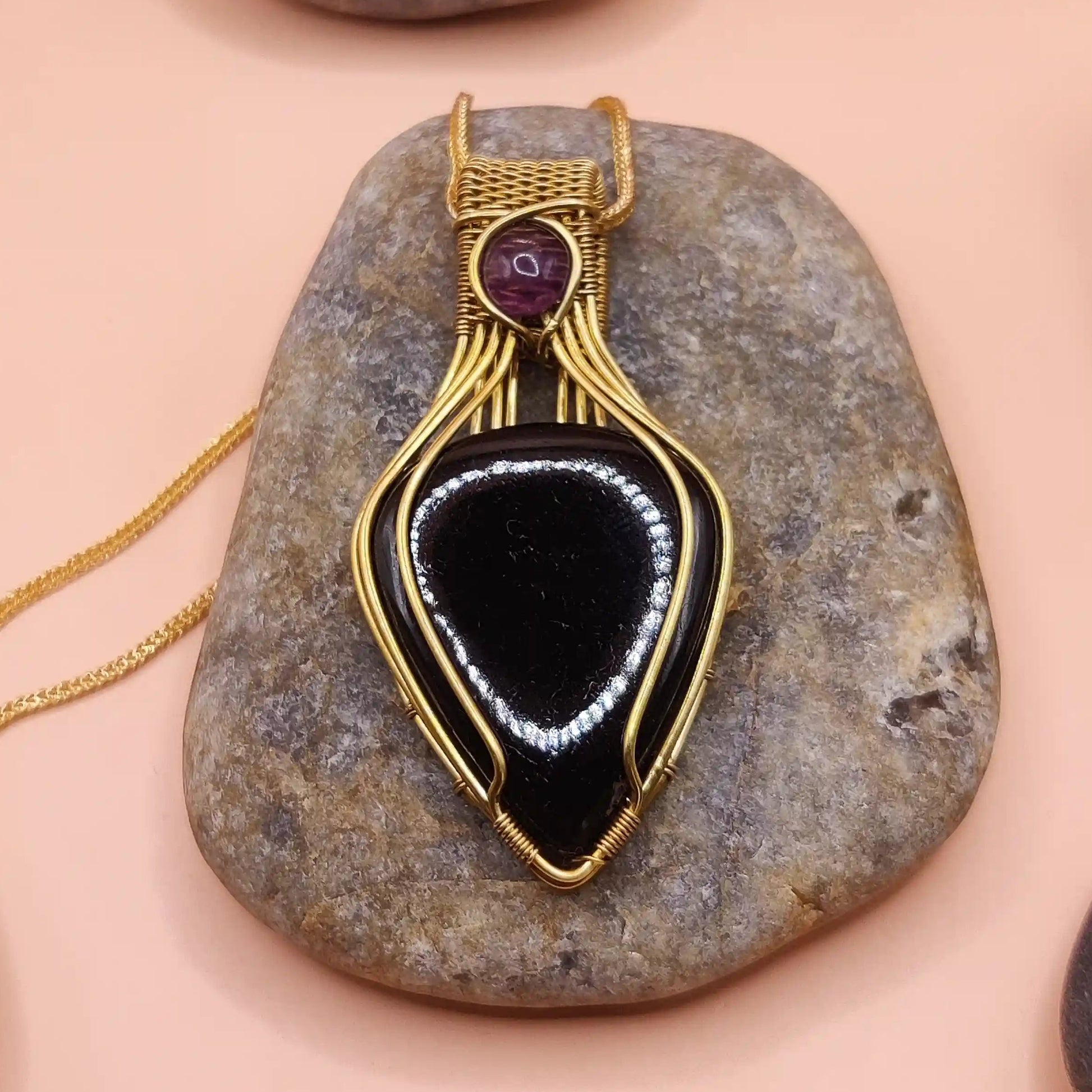 Advithi 002 black tourmaline and amethyst locket in brass  handmade by sanguine aura, India