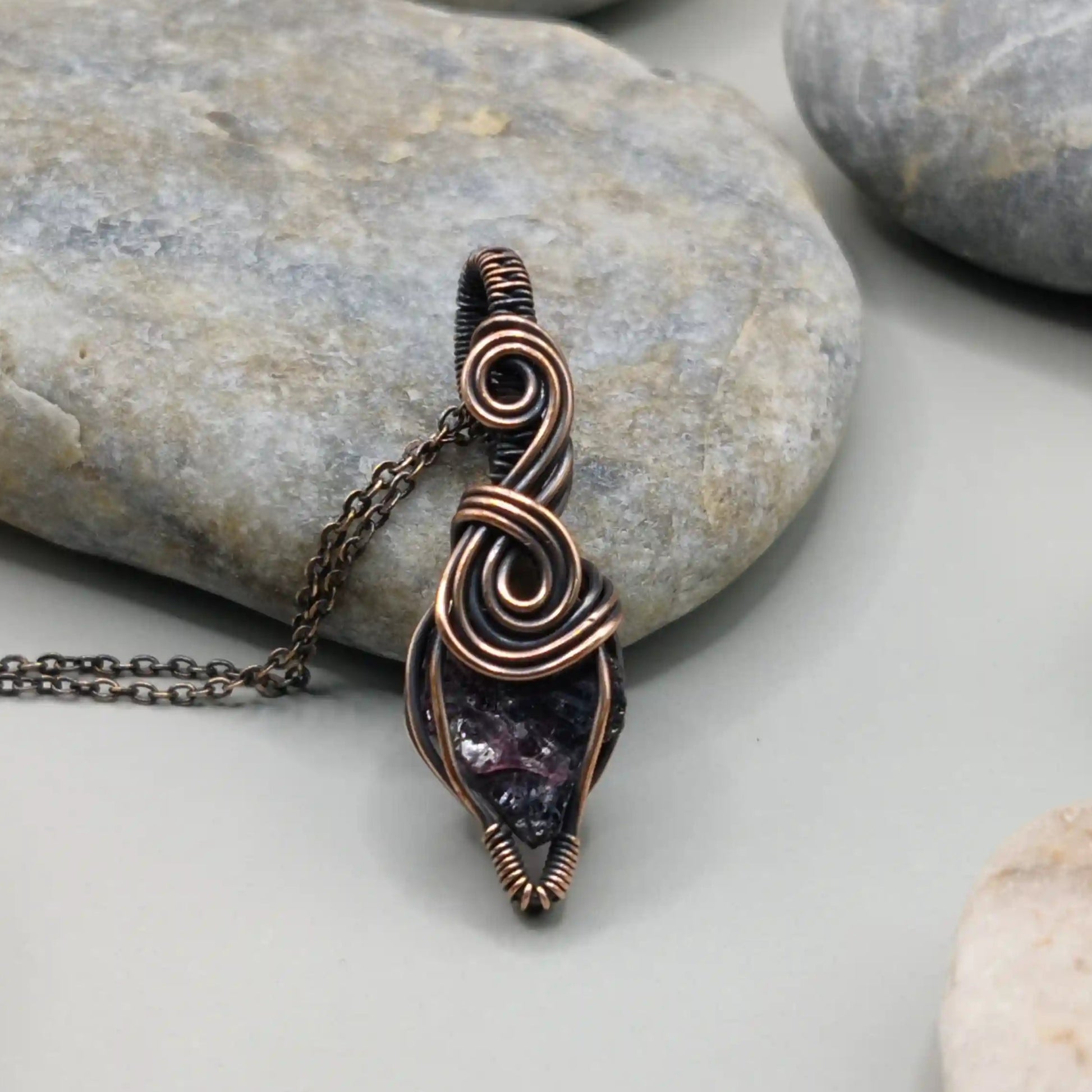 Niyati raw garnet pendant in antiqued copper 001 close up by Sanguine Aura, India