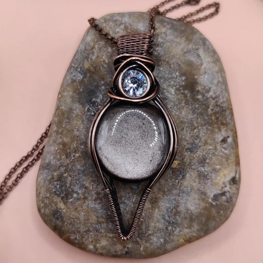 Viti natural silver sheen black obsidian pendant made with brass by sanguine aura handcrafted jewellery, India