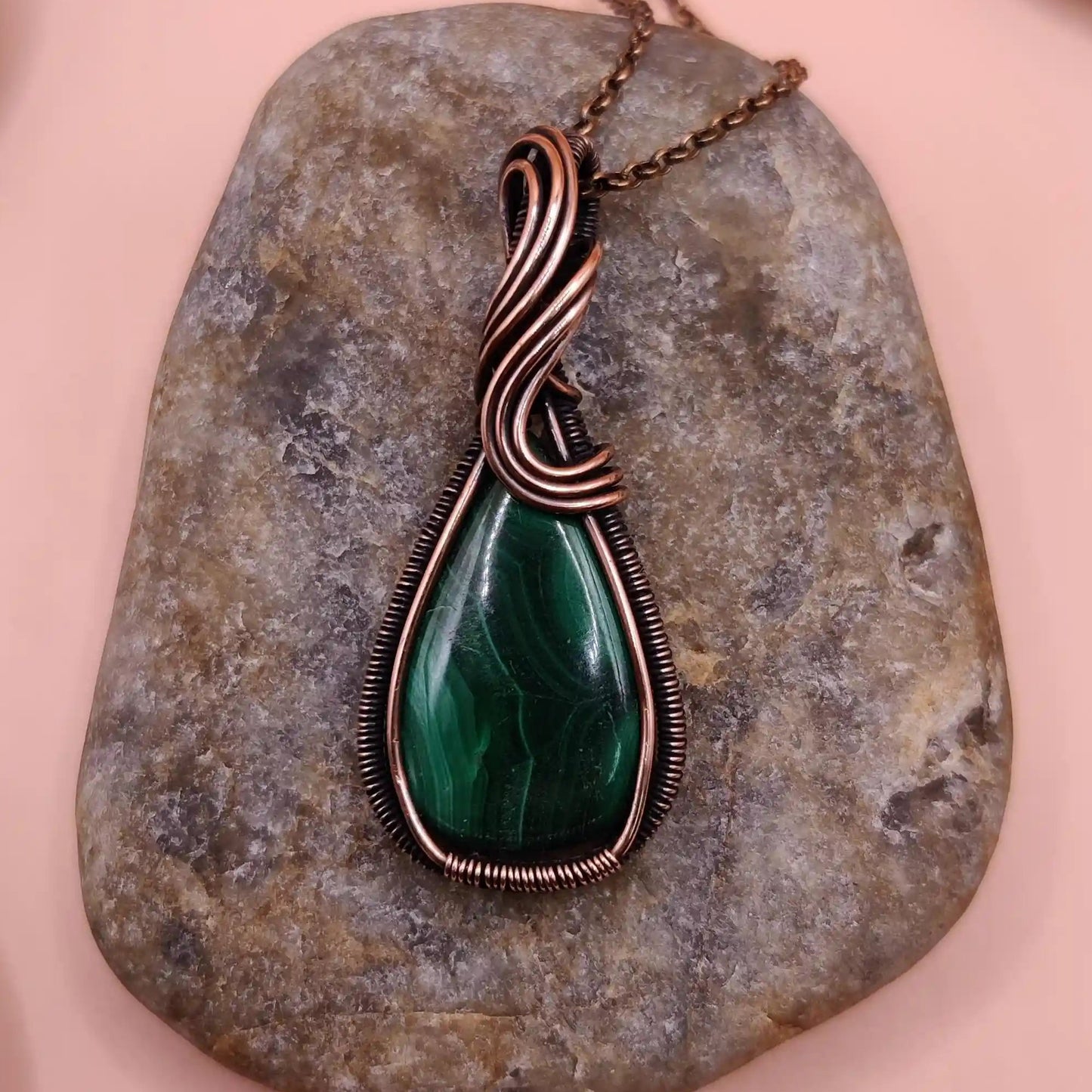 a natural malachite pendant made with pure copper for mind-body energy connection by sanguine aura handcrafted crystal jewellery