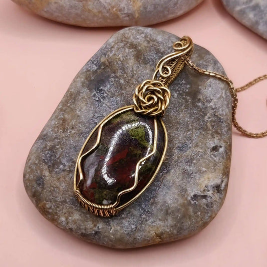 natural bloodstone in brass pendant in Dakshi pattern by Sanguine Aura handcrafted jewellery, India