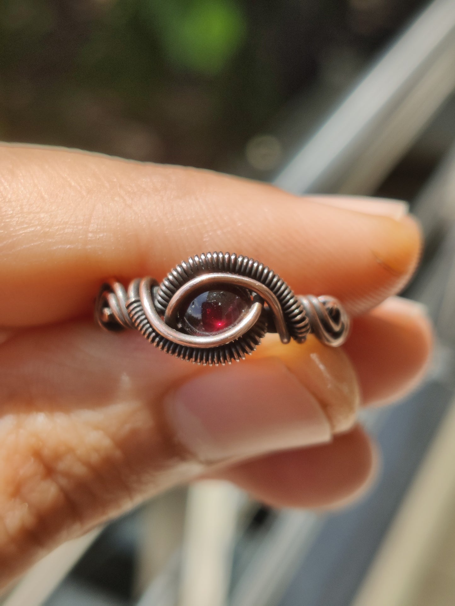 Garnet and copper ring in oxidized copper handmade by sanguine aura handcrafted jewellery, front view