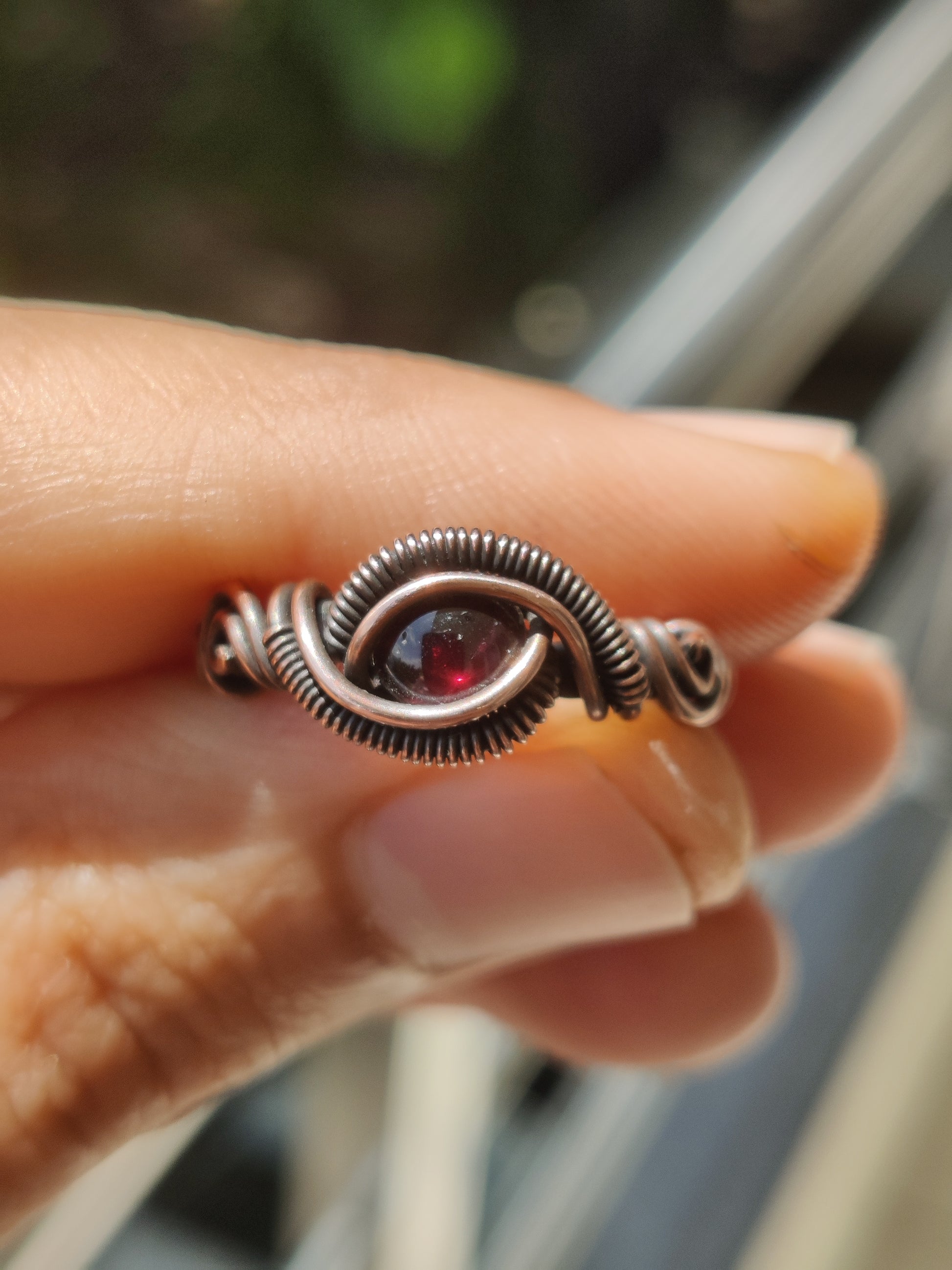 Garnet and copper ring in oxidized copper handmade by sanguine aura handcrafted jewellery, front view