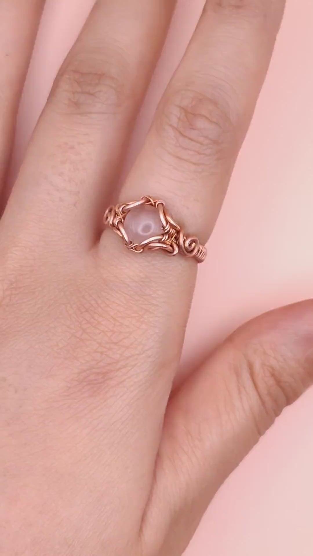 A complete view of the Anya ring by Sanguine Aura. The Anya ring is made of pure copper and natural high quality rose quartz
