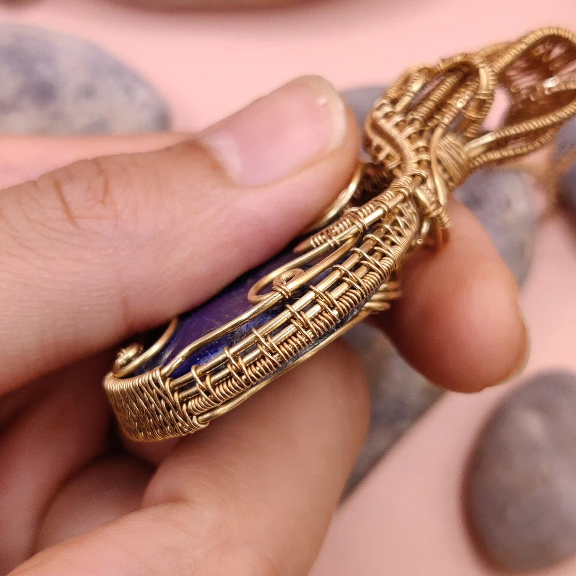 Aadhya 003 side view of Lapis lazuli locket in brass displaying the intricate details handcrafted by sanguine aura handmade jewelry, India 
