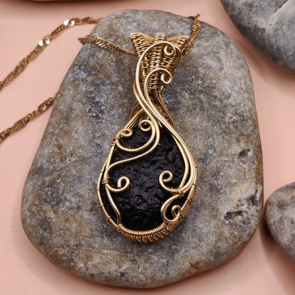 Aadhya raw tektite chintamani locket 004 in brass used for meditation and protection made by sanguine aura