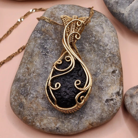 Aadhya raw tektite chintamani locket 004 in brass used for meditation and protection made by sanguine aura