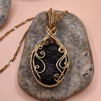 Aadhya raw tektite locket 003 in brass made with natural tektite for meditation.