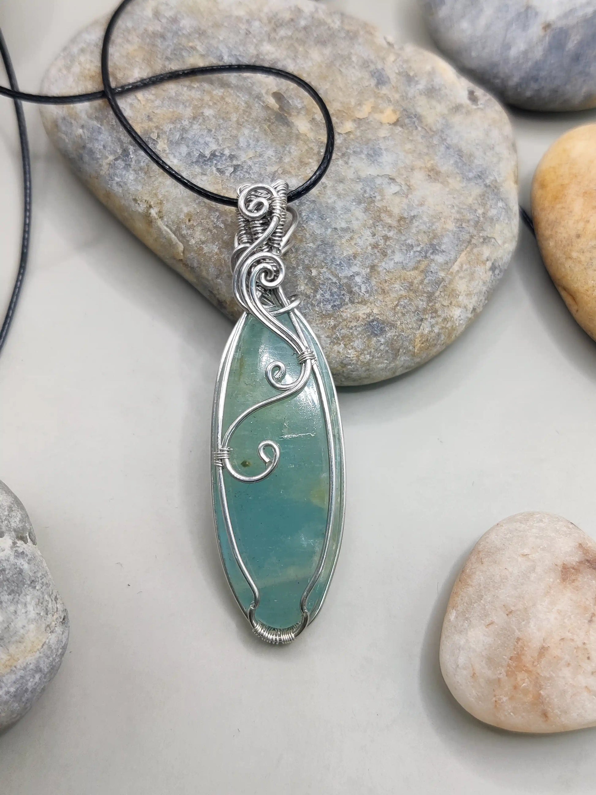 Dakshi- Aquamarine silver pendant's back view. Created by Sanguine Aura Handcrafted jewellery