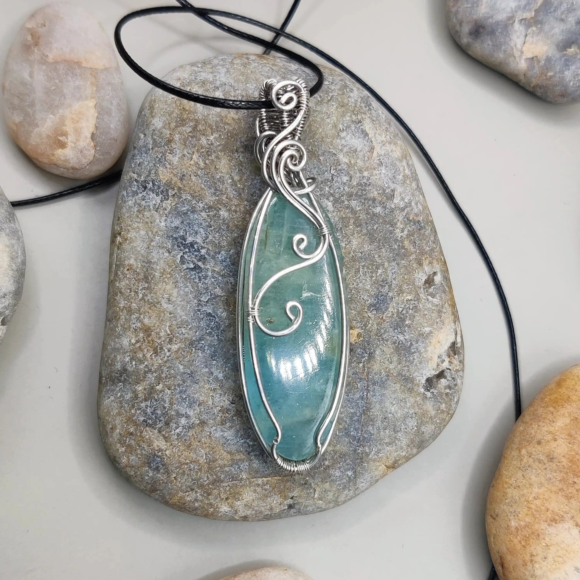 Dakshi- Aquamarine silver pendant's closeup back view. Created by Sanguine Aura Handcrafted jewellery
