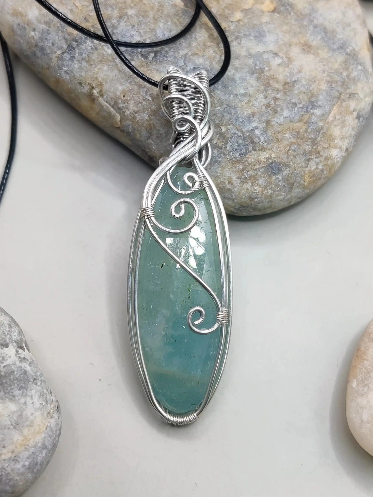 Dakshi- Aquamarine silver pendant's closeup view. Created by Sanguine Aura Handcrafted jewellery