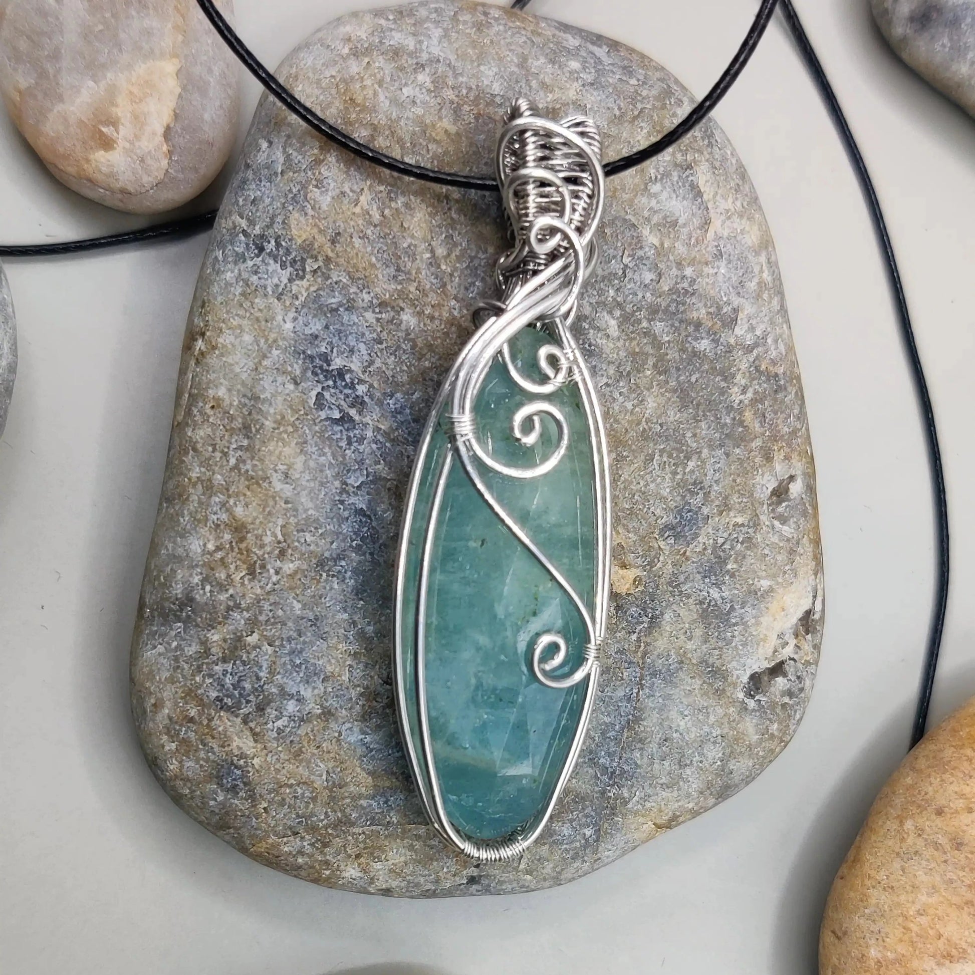Dakshi- Aquamarine silver pendant's closeup view. Created by Sanguine Aura Handcrafted jewellery