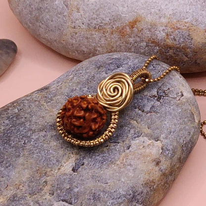Dheera panchamukhi rudraksha pendant in brass made by sanguine aura handcrafted jewellery