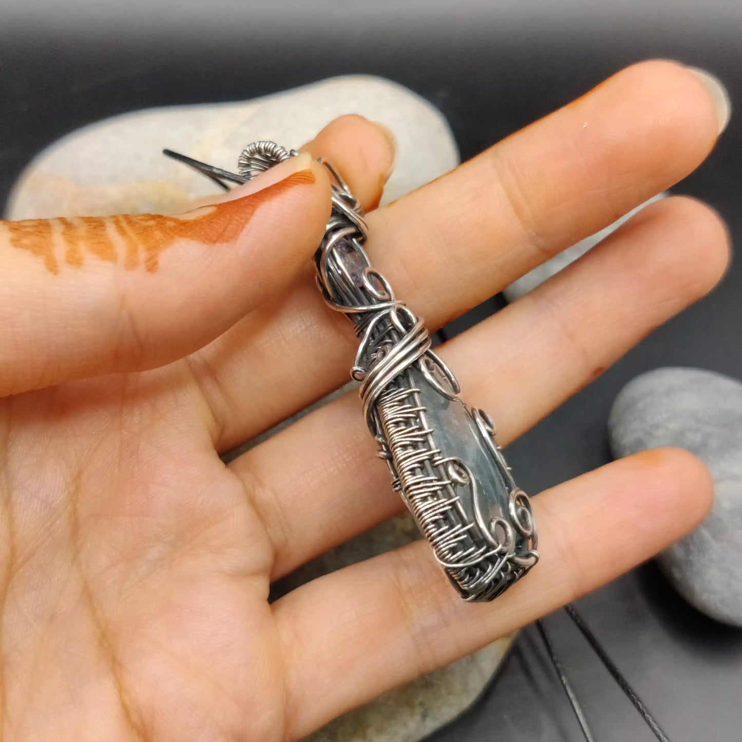 Kahaan aquamarine silver pendant side detailing by local artists who sit and work on the details for days before completing a piece