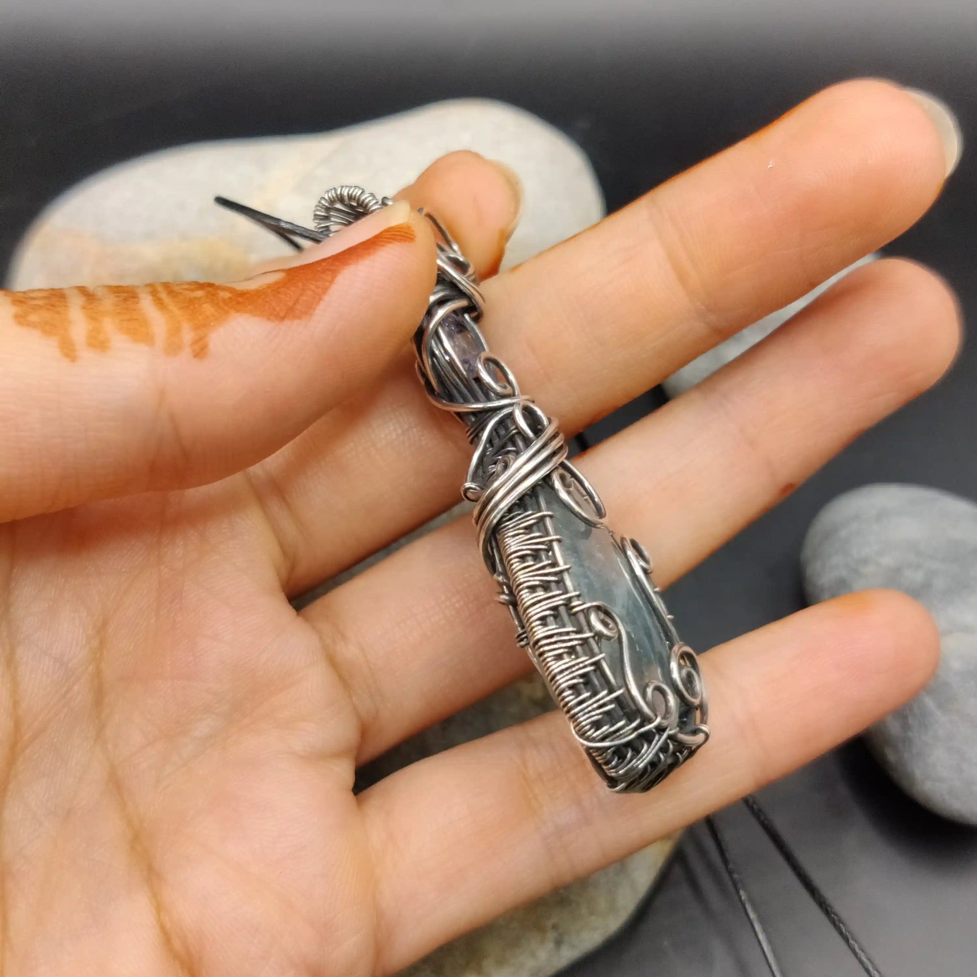 Kahaan aquamarine silver pendant side detailing by local artists who sit and work on the details for days before completing a piece