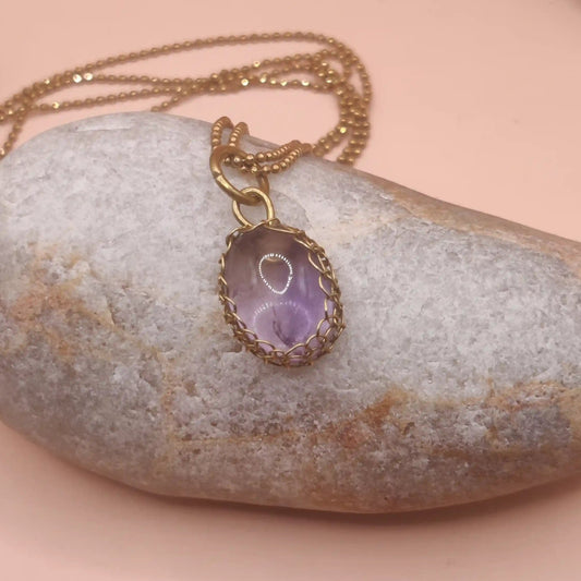 Meera amethyst pendant 003 made with natural amethyst and brass by sanguine aura. 