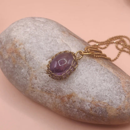 Meera amethyst pendant 004 made with natural amethyst and antibacterial brass by sanguine aura in India.