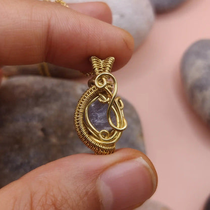 Niyati corundum/sapphire pendant in brass made by sanguine aura handcrafted jewellery