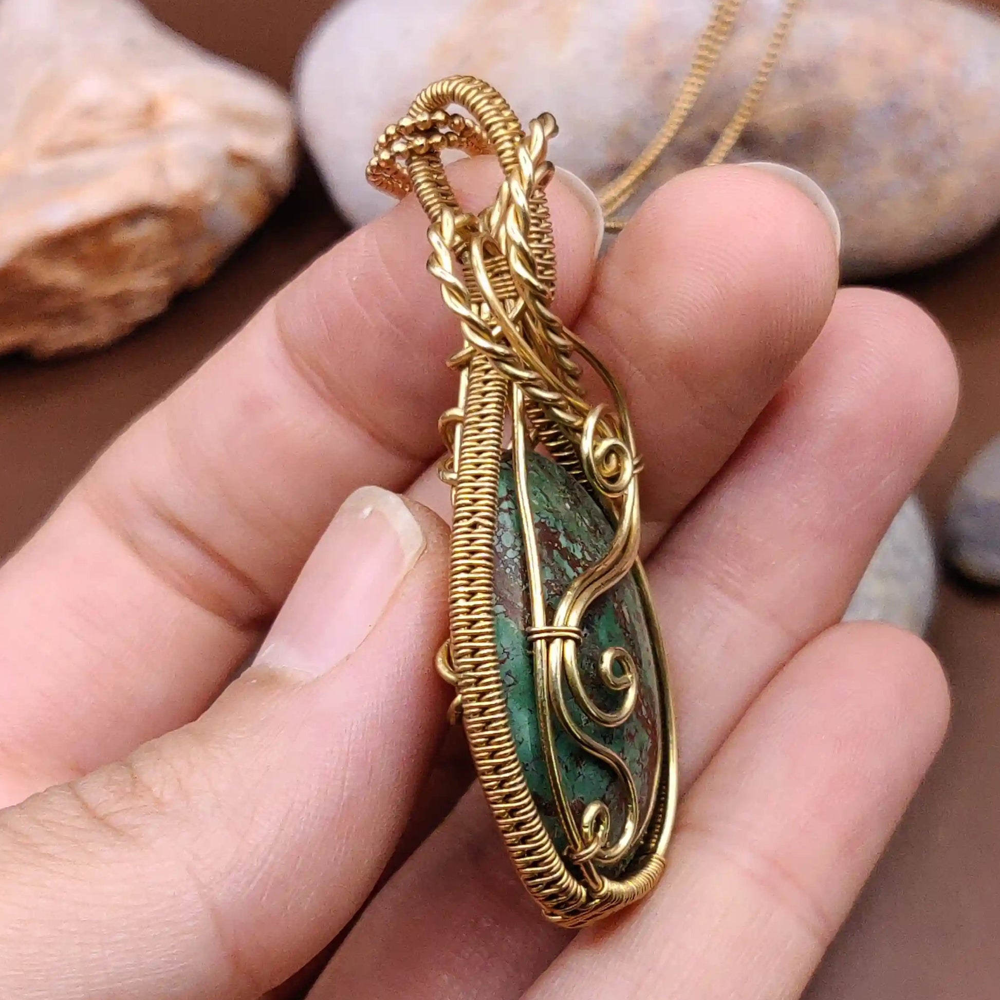 Prisha 002 tibetan turquoise brass pendant side view of intricate pattern made by sanguine aura handcrafted jewellery, India 