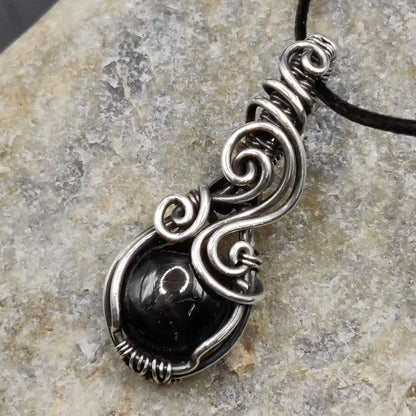 Tanvi star diopside sterling silver oxidized pendant wire wrapped by Ridhi Jethani