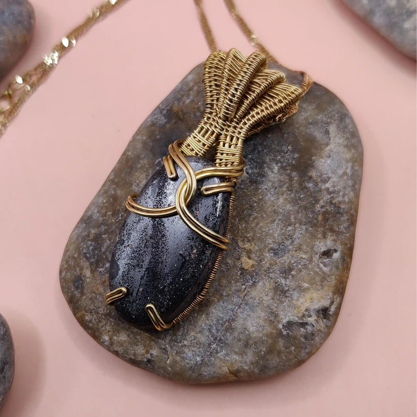 chaitya hematite necklace in brass 004, side view. Made by sanguine aura handcrafted jewellery, pune