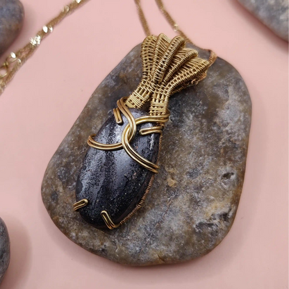 chaitya hematite necklace in brass 004, side view. Made by sanguine aura handcrafted jewellery, pune