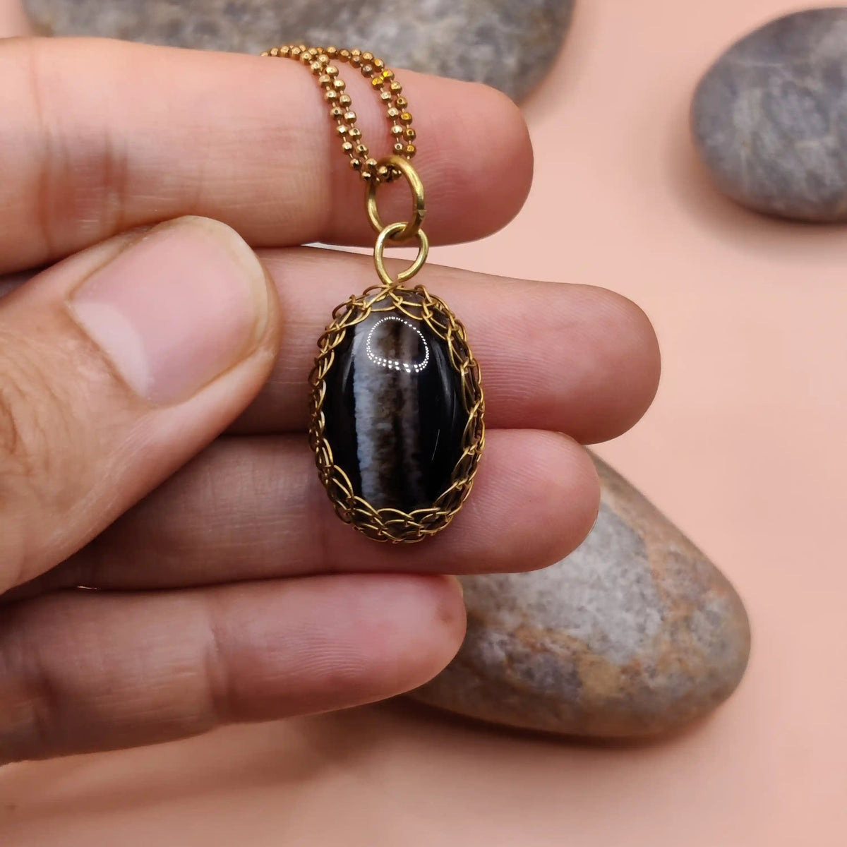meera - sulemani hakik brass pendant 001 made with natural banded agate and antibacterial brass by sanguine aura.