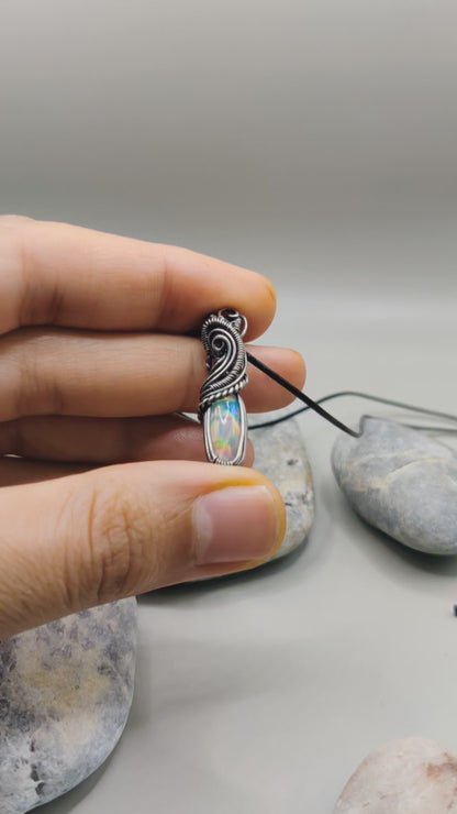 Banno, an Ethiopian opal silver pendant. this pendant has been created by Sanguine Aura.