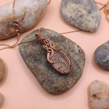 runi 007 rose quartz copper necklace left side view, made by sanguine aura handmade crystal jewellery